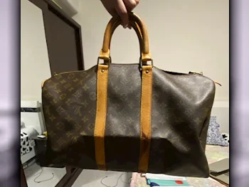 Travel Bags  - Louis Vuitton  - Brown  - Genuine Leather  - Unisex