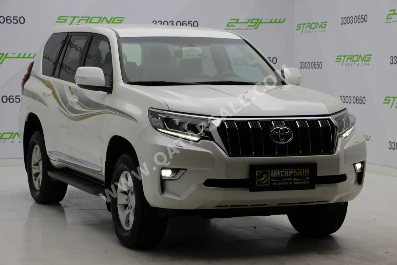 Toyota  Prado  TXL  2019  Automatic  112,000 Km  6 Cylinder  Four Wheel Drive (4WD)  SUV  White