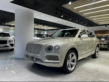 Bentley  Bentayga  2020  Automatic  24,000 Km  8 Cylinder  Four Wheel Drive (4WD)  SUV  Light Gold  With Warranty