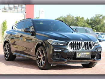  BMW  X-Series  X6 40i  2021  Automatic  103,000 Km  6 Cylinder  Four Wheel Drive (4WD)  SUV  Black  With Warranty