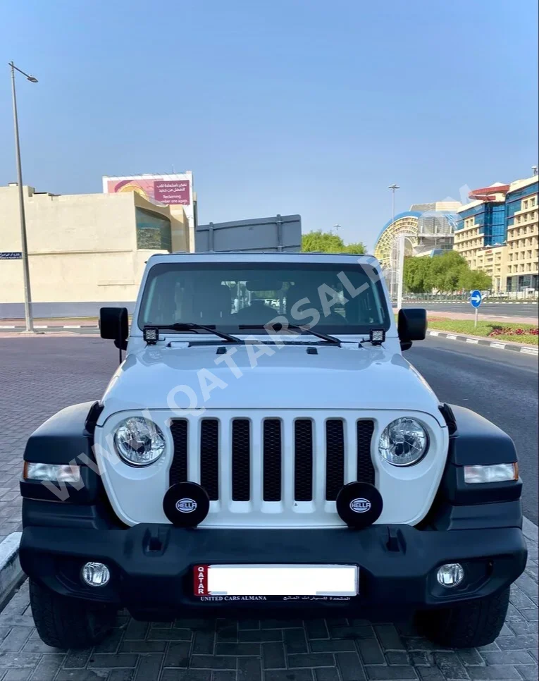 Jeep  Wrangler  Sport  2018  Automatic  71,000 Km  6 Cylinder  Four Wheel Drive (4WD)  SUV  White