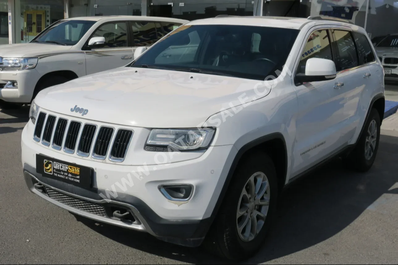 Jeep  Grand Cherokee  Limited  2016  Automatic  22,000 Km  8 Cylinder  Four Wheel Drive (4WD)  SUV  White