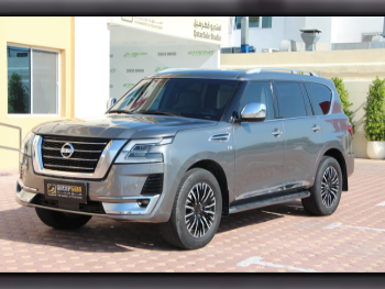Nissan  Patrol  Platinum  2015  Automatic  91,000 Km  8 Cylinder  Four Wheel Drive (4WD)  SUV  Gray