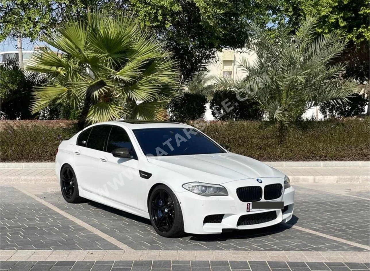 BMW  M-Series  5  2013  Automatic  109٬000 Km  8 Cylinder  Rear Wheel Drive (RWD)  Sedan  White