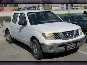  Nissan  Navara  2014  Manual  390,000 Km  4 Cylinder  Rear Wheel Drive (RWD)  Pick Up  White  With Warranty