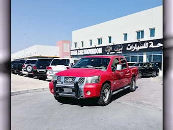 Nissan  Navara  2006  Automatic  207,000 Km  4 Cylinder  Rear Wheel Drive (RWD)  Pick Up  Red