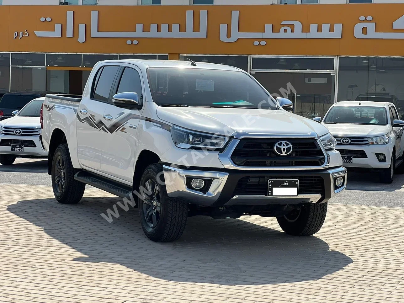 Toyota  Hilux  2024  Automatic  7,000 Km  4 Cylinder  Four Wheel Drive (4WD)  Pick Up  White  With Warranty