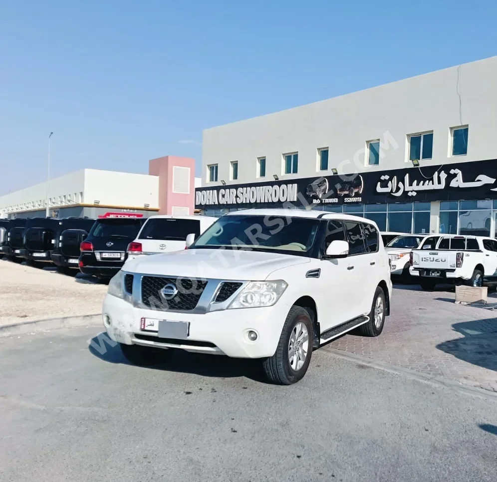 Nissan  Patrol  SE  2011  Automatic  288,000 Km  8 Cylinder  Four Wheel Drive (4WD)  SUV  White