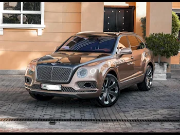 Bentley  Bentayga  Mulliner  2018  Automatic  60,000 Km  12 Cylinder  All Wheel Drive (AWD)  SUV  Brown  With Warranty