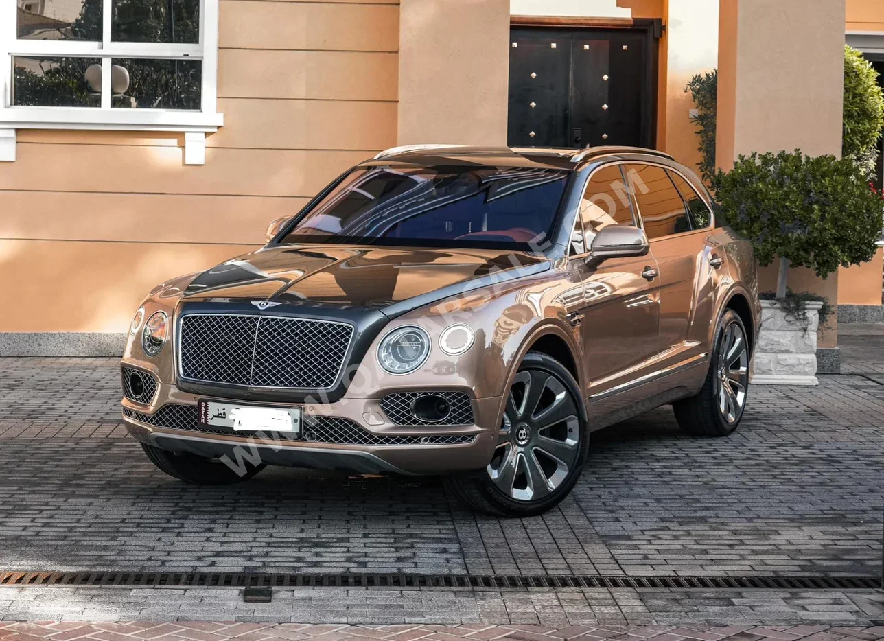 Bentley  Bentayga  Mulliner  2018  Automatic  60,000 Km  12 Cylinder  All Wheel Drive (AWD)  SUV  Brown  With Warranty