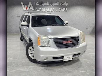 GMC  Yukon  XL  2011  Automatic  181,000 Km  8 Cylinder  Four Wheel Drive (4WD)  SUV  Silver