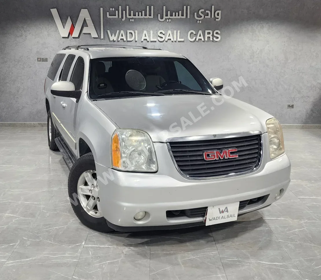 GMC  Yukon  XL  2011  Automatic  181,000 Km  8 Cylinder  Four Wheel Drive (4WD)  SUV  Silver