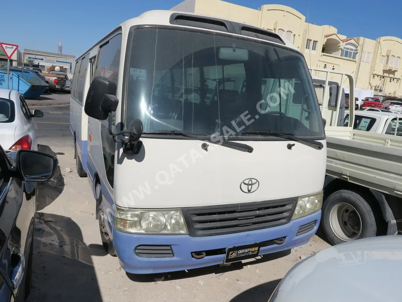 Toyota  Coaster  2009  Manual  270,000 Km  4 Cylinder  Rear Wheel Drive (RWD)  Van / Bus  White