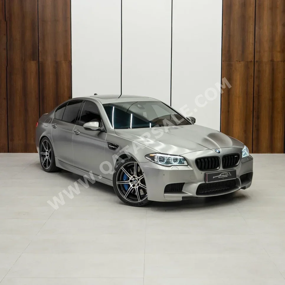 BMW  M-Series  5 Jahre Edition  2015  Automatic  50,485 Km  8 Cylinder  Front Wheel Drive (FWD)  Sedan  Silver