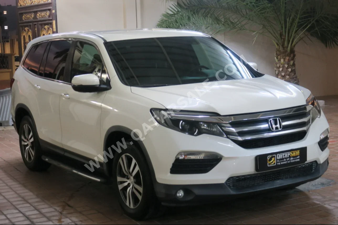 Honda  Pilot  2016  Automatic  50,000 Km  6 Cylinder  Four Wheel Drive (4WD)  SUV  White