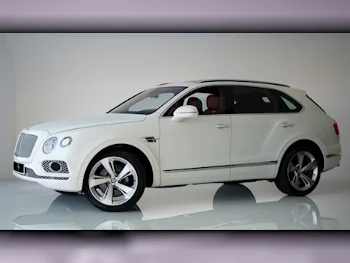 Bentley  Bentayga  2018  Automatic  55٬000 Km  12 Cylinder  Four Wheel Drive (4WD)  SUV  White