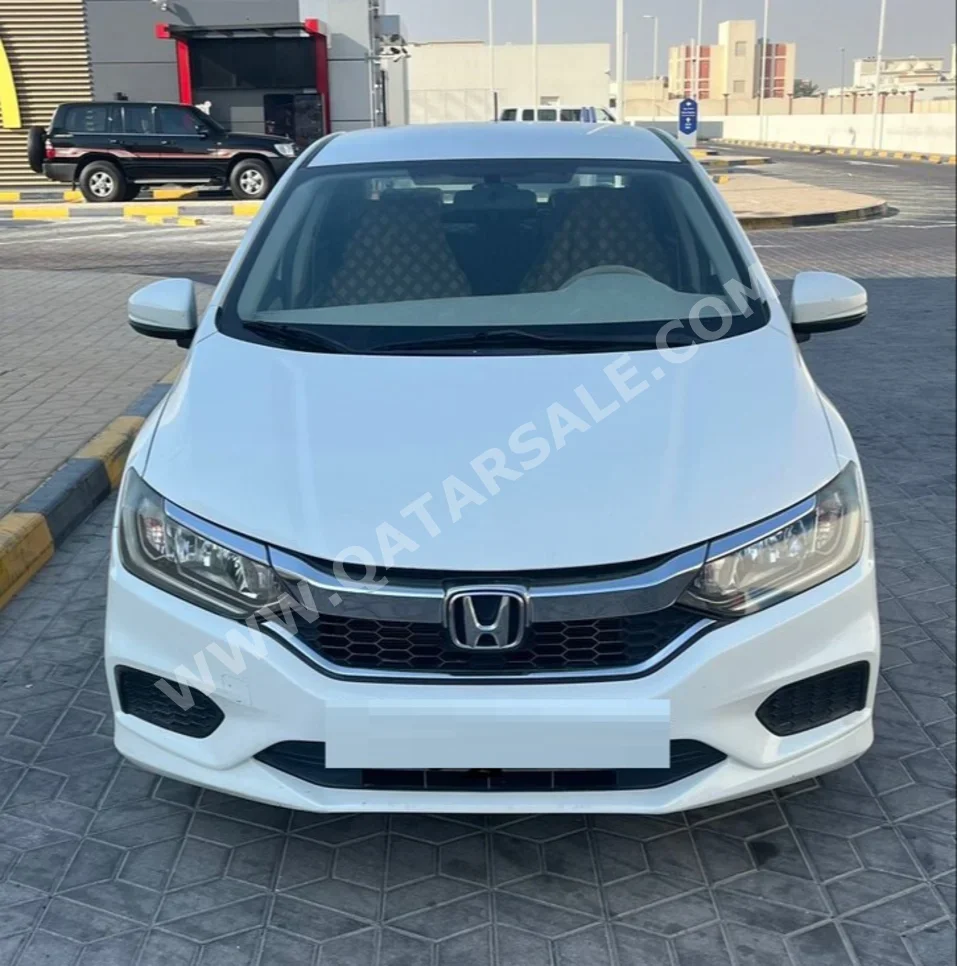 Honda  City  2019  Automatic  89,000 Km  4 Cylinder  Front Wheel Drive (FWD)  Sedan  White