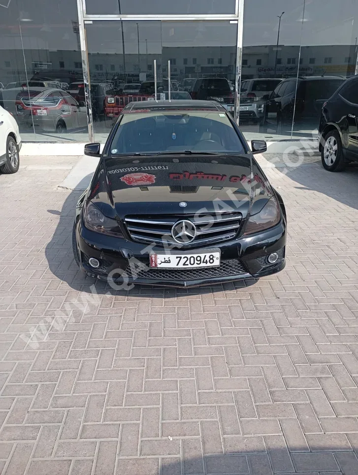 Mercedes-Benz  C-Class  200  2014  Automatic  154,000 Km  4 Cylinder  Rear Wheel Drive (RWD)  Sedan  Black