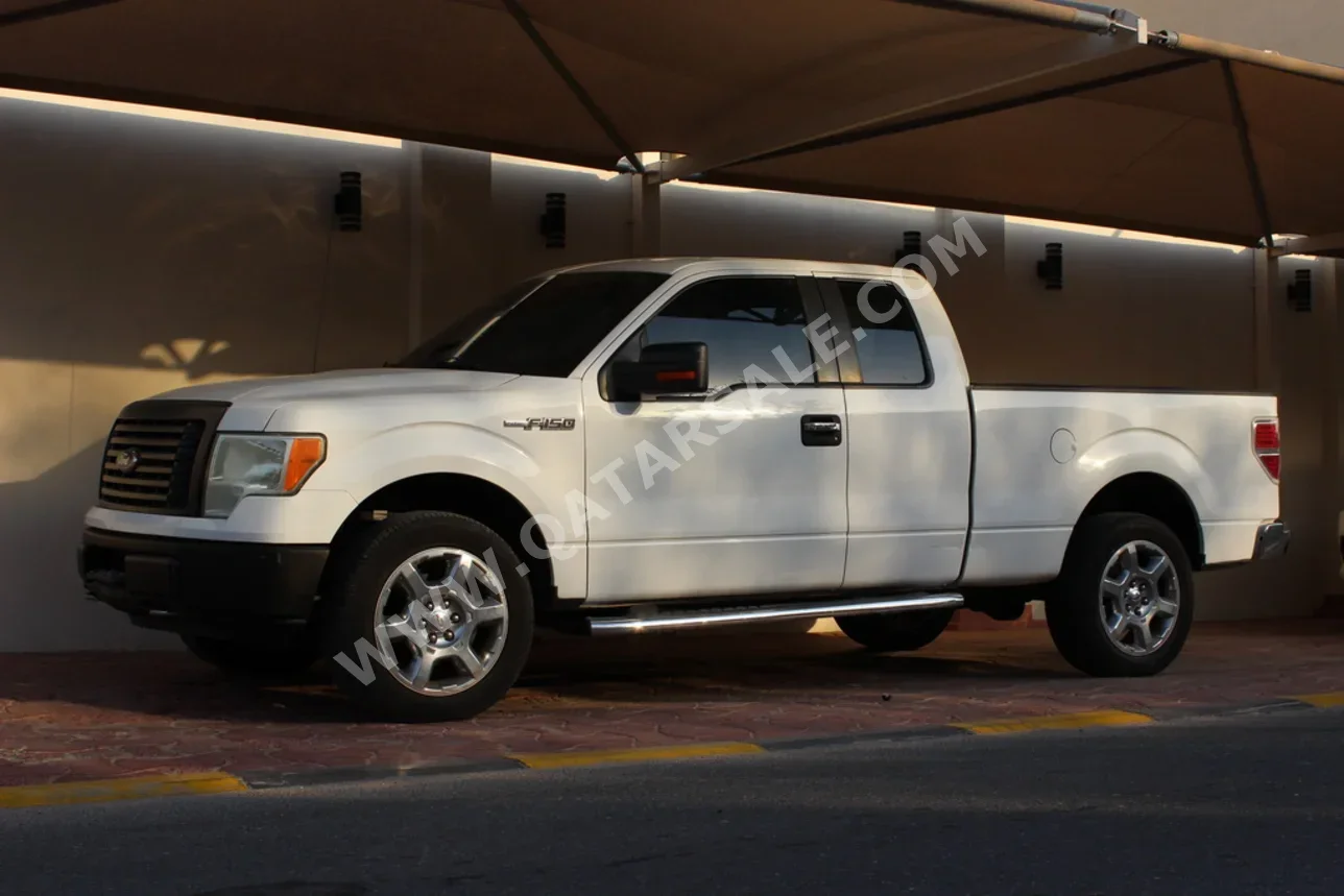  Ford  F  150  2012  Automatic  120,000 Km  6 Cylinder  Four Wheel Drive (4WD)  Pick Up  White  With Warranty