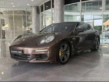 Porsche  Panamera  S  2014  Automatic  135,000 Km  8 Cylinder  Rear Wheel Drive (RWD)  Sedan  Brown