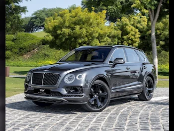 Bentley  Bentayga  2018  Automatic  60,000 Km  12 Cylinder  Four Wheel Drive (4WD)  SUV  Gray  With Warranty