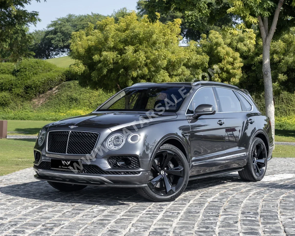 Bentley  Bentayga  2018  Automatic  60,000 Km  12 Cylinder  Four Wheel Drive (4WD)  SUV  Gray  With Warranty