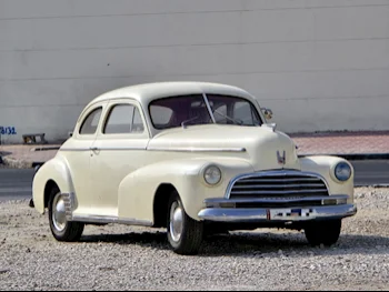 Chrysler  Classic  1946  Automatic  50,000 Km  8 Cylinder  Rear Wheel Drive (RWD)  Sedan  Pearl