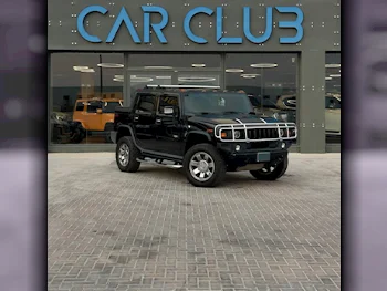 Hummer  H2  2009  Automatic  179٬000 Km  8 Cylinder  Four Wheel Drive (4WD)  SUV  Black