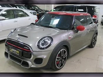 Mini  Cooper  JCW  2021  Automatic  61,000 Km  4 Cylinder  Front Wheel Drive (FWD)  Hatchback  Gray  With Warranty