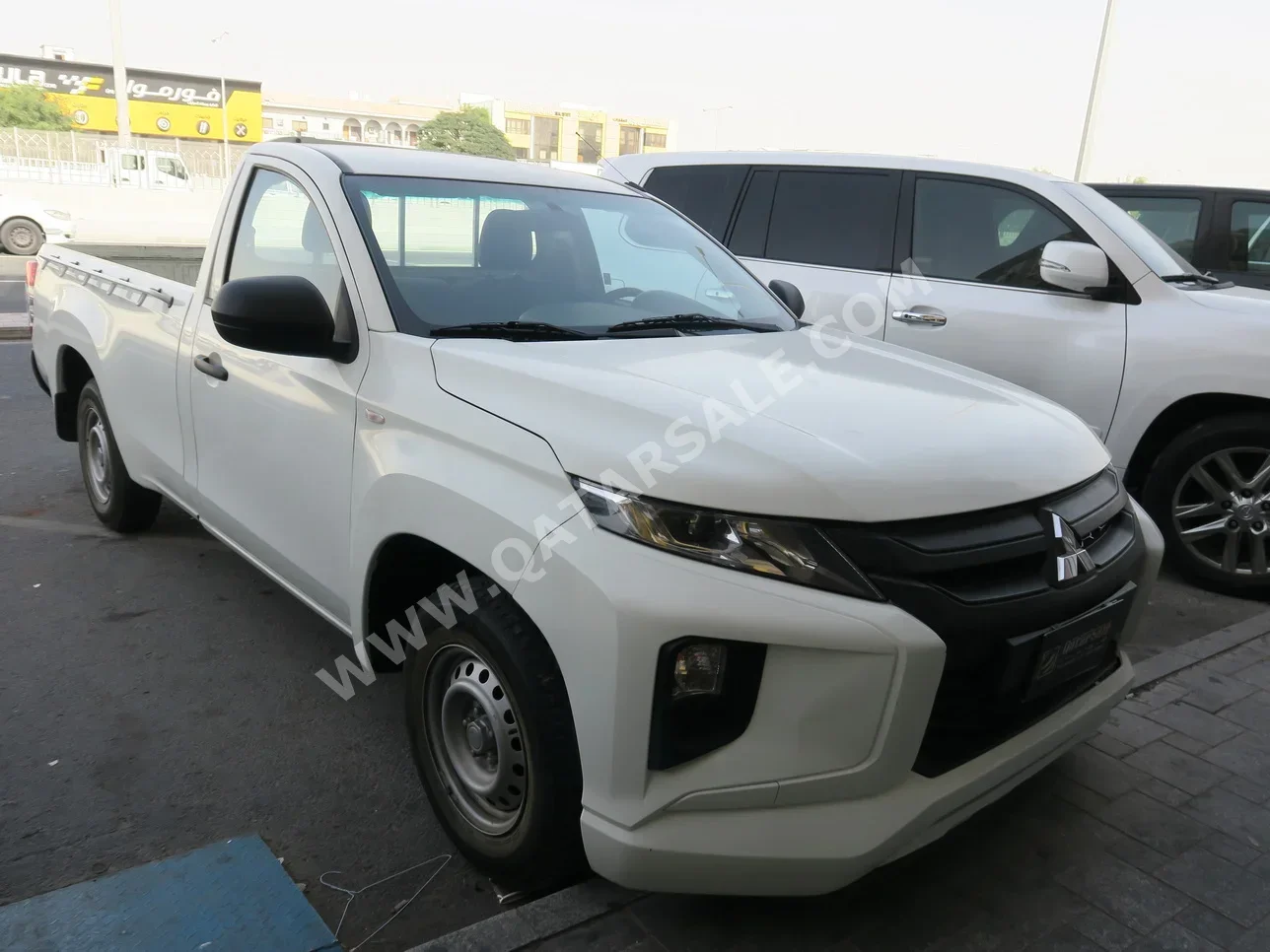 Mitsubishi  L 200  2022  Manual  132,000 Km  4 Cylinder  Rear Wheel Drive (RWD)  Pick Up  White