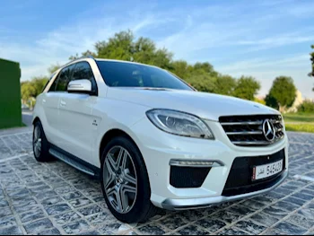 مرسيدس - بنز  ام ال  63 AMG  2014  اوتوماتيك  80,000 كم  8 سلندر  دفع رباعي  اس يو في  أبيض