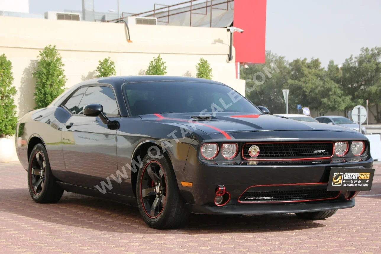 Dodge  Challenger  2013  Automatic  125,000 Km  6 Cylinder  Rear Wheel Drive (RWD)  Coupe / Sport  Black