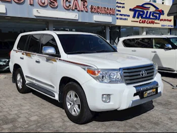  Toyota  Land Cruiser  GXR  2015  Automatic  245,000 Km  8 Cylinder  Four Wheel Drive (4WD)  SUV  White  With Warranty