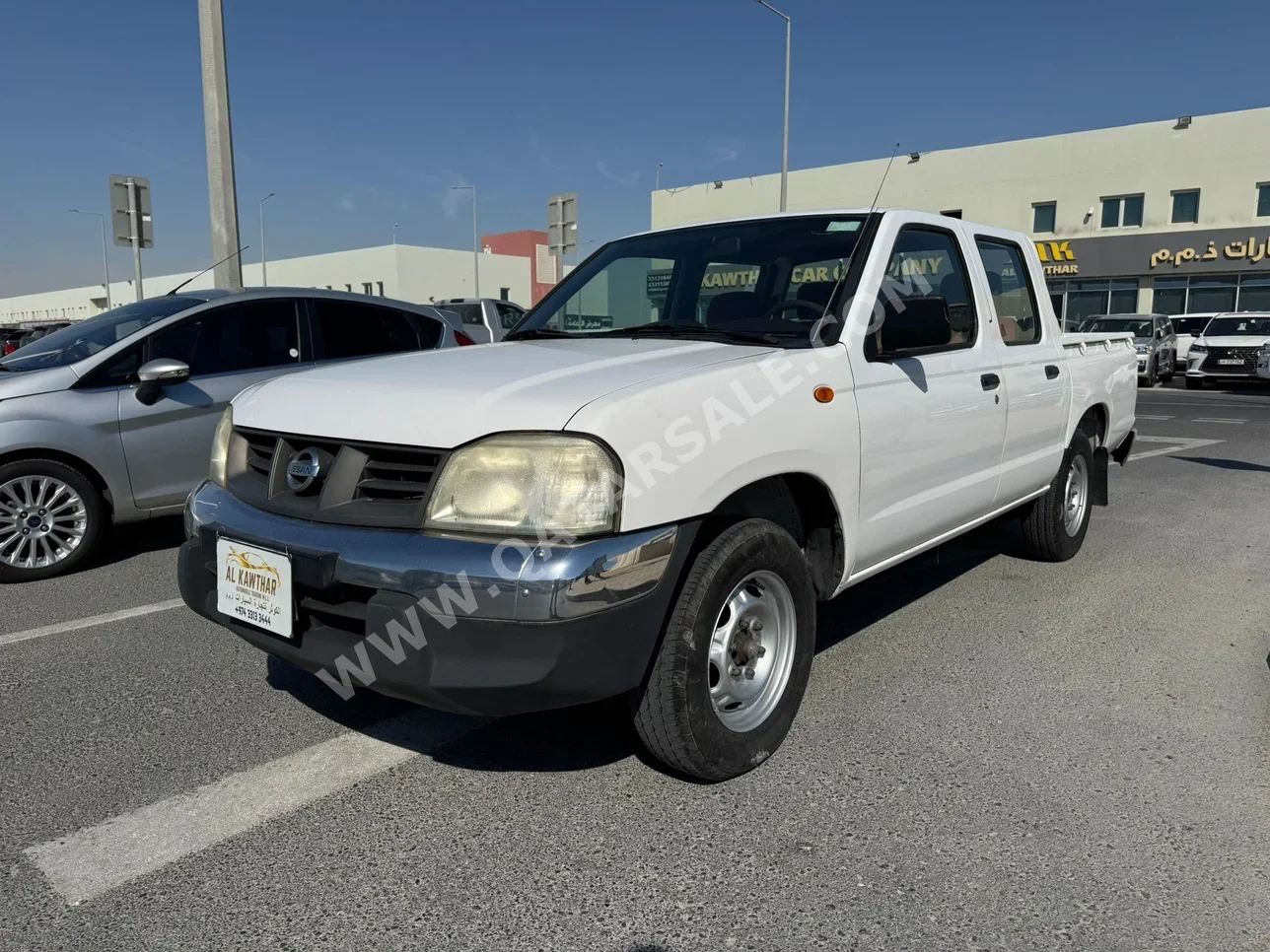 Nissan  Pickup  2016  Manual  292,000 Km  4 Cylinder  Rear Wheel Drive (RWD)  Pick Up  White