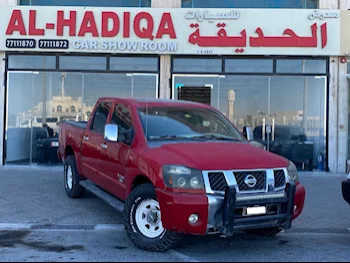 Nissan  Titan  2006  Automatic  207,000 Km  6 Cylinder  Four Wheel Drive (4WD)  Pick Up  Red