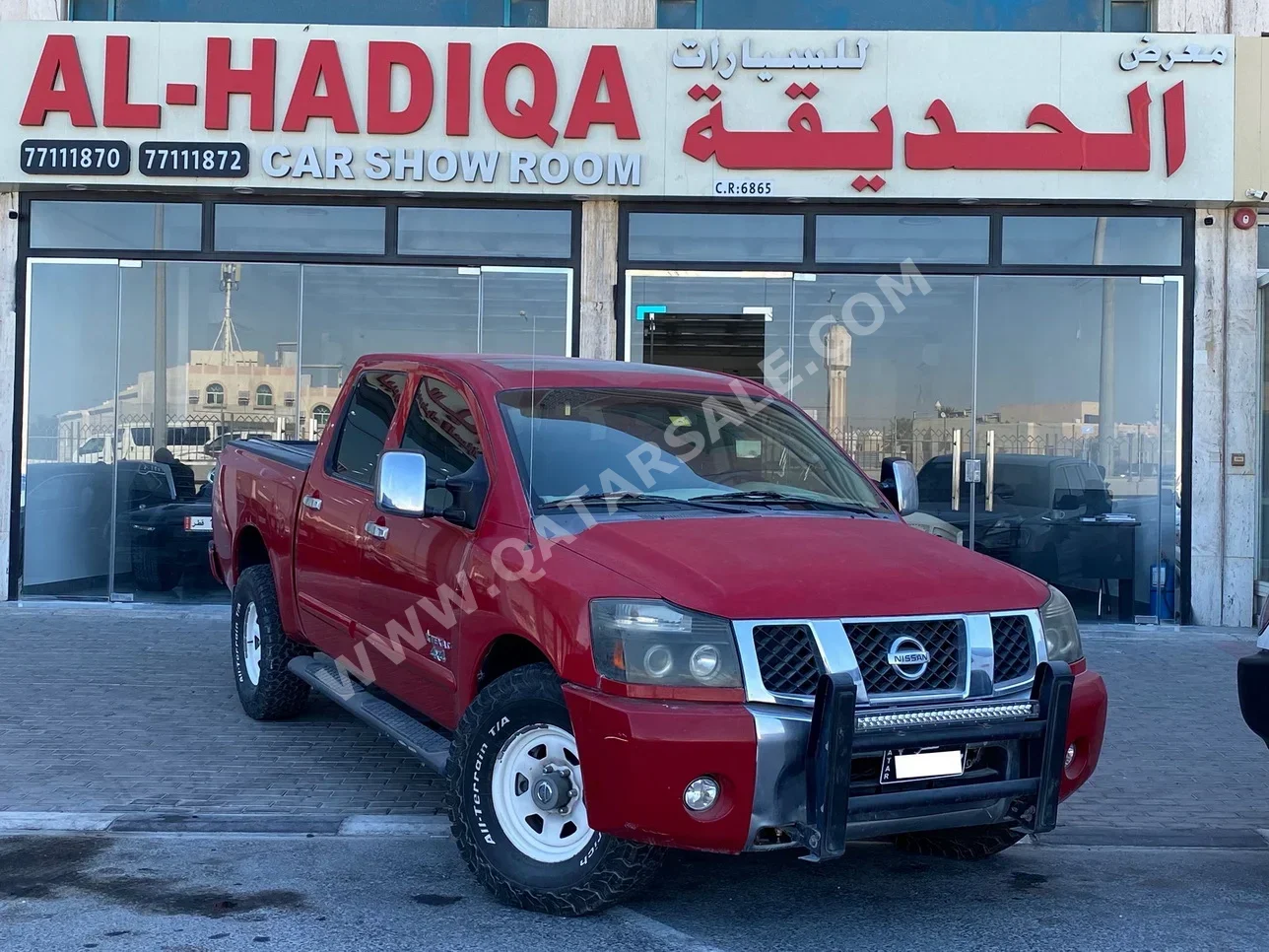 Nissan  Titan  2006  Automatic  207,000 Km  6 Cylinder  Four Wheel Drive (4WD)  Pick Up  Red