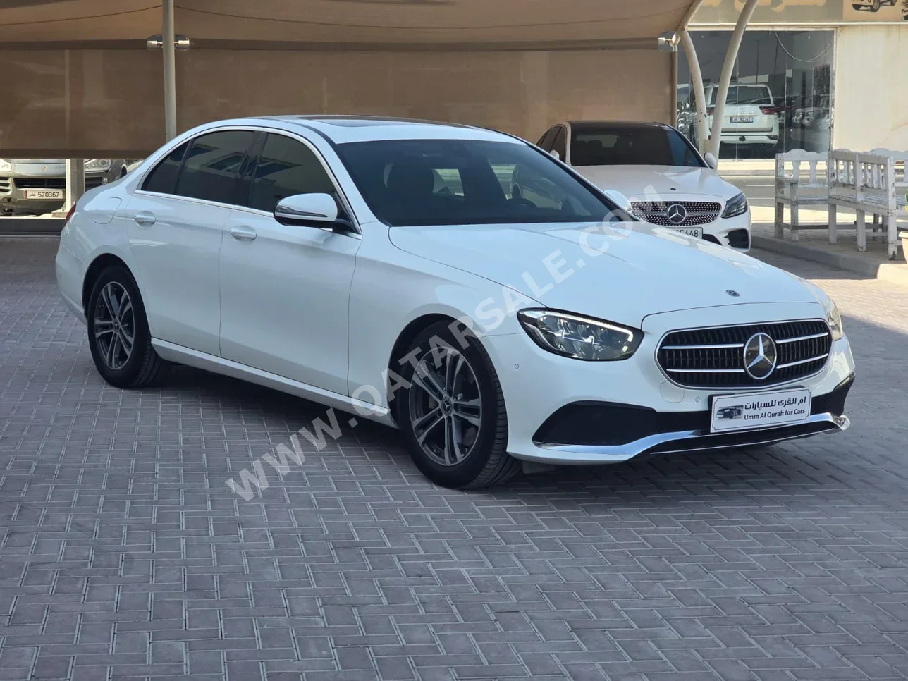 Mercedes-Benz  E-Class  200  2021  Automatic  87,000 Km  4 Cylinder  Rear Wheel Drive (RWD)  Sedan  White