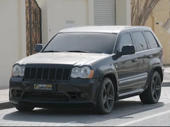 Jeep  Grand Cherokee  SRT-8  2009  Automatic  208,000 Km  8 Cylinder  Four Wheel Drive (4WD)  SUV  Black