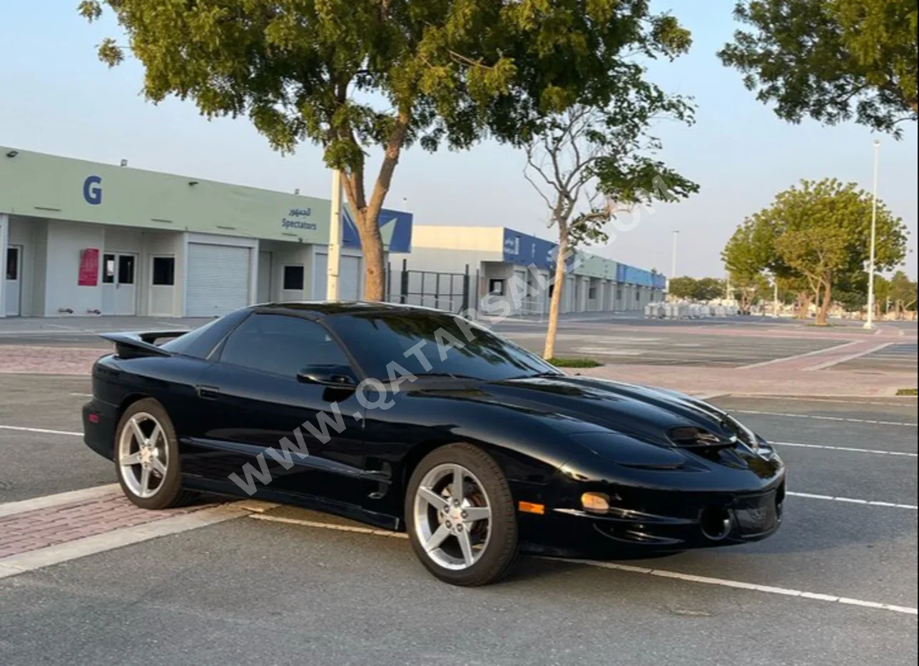 بونتياك  ترانز ام  2002  عادي  65,000 كم  8 سلندر  دفع خلفي  كوبيه \ سبورت  أسود