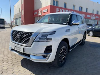 Nissan  Patrol  Platinum  2023  Automatic  0 Km  6 Cylinder  Four Wheel Drive (4WD)  SUV  White  With Warranty