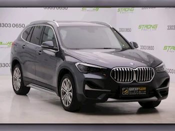 BMW  X-Series  X1  2022  Automatic  39,000 Km  4 Cylinder  Rear Wheel Drive (RWD)  SUV  Gray  With Warranty