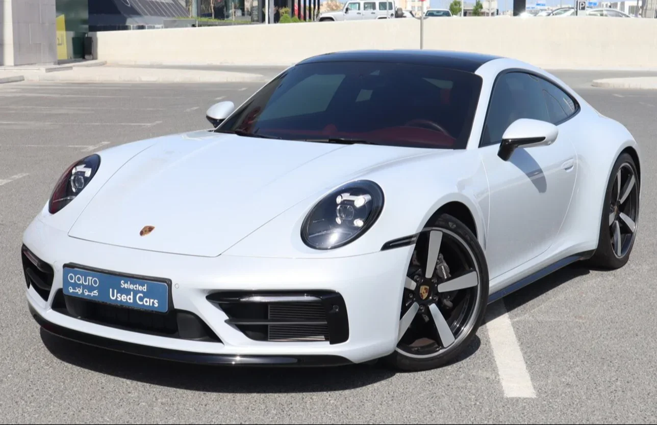 Porsche  911  Carrera  2024  Automatic  9,000 Km  6 Cylinder  Rear Wheel Drive (RWD)  Coupe / Sport  White  With Warranty