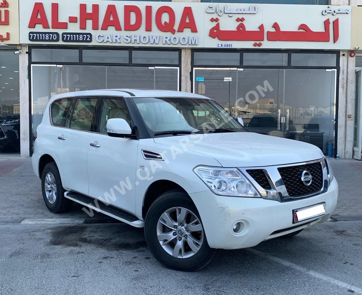  Nissan  Patrol  SE  2013  Automatic  261,000 Km  8 Cylinder  Four Wheel Drive (4WD)  SUV  White  With Warranty