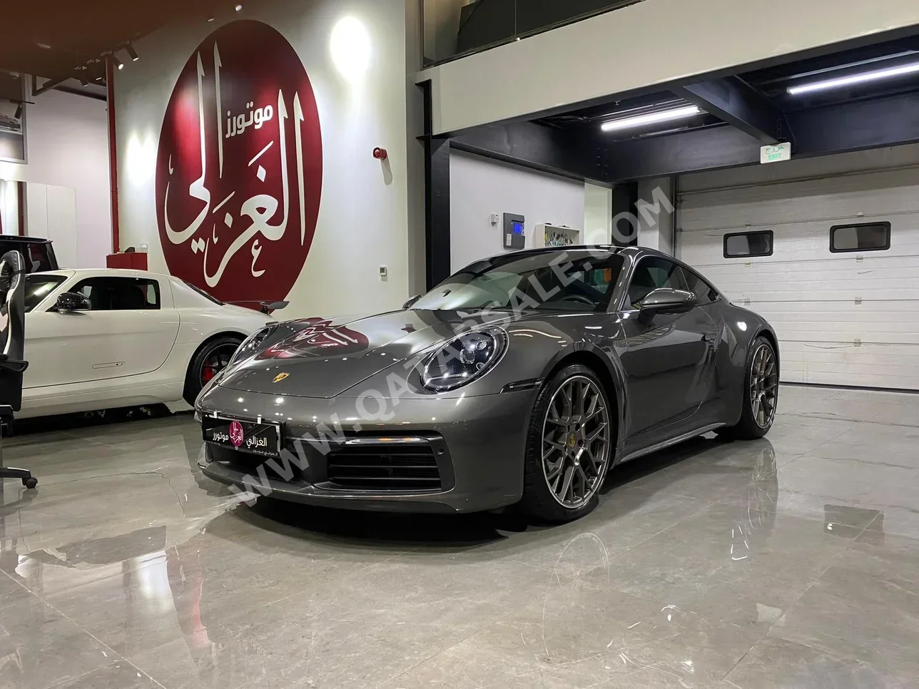 Porsche  911  Carrera  2021  Automatic  47,000 Km  6 Cylinder  Rear Wheel Drive (RWD)  Coupe / Sport  Gray