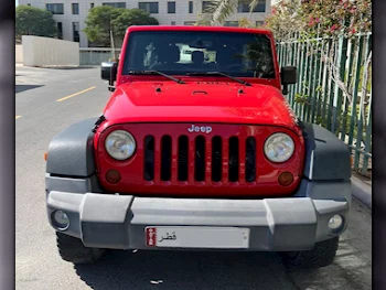 Jeep  Wrangler  Sport  2015  Automatic  102,000 Km  6 Cylinder  Four Wheel Drive (4WD)  SUV  Red