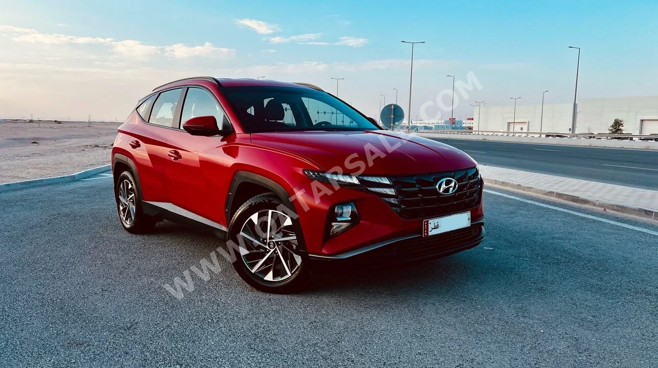 Hyundai  Tucson  2022  Automatic  30,000 Km  4 Cylinder  Front Wheel Drive (FWD)  SUV  Red  With Warranty