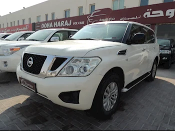 Nissan  Patrol  XE  2014  Automatic  252,000 Km  6 Cylinder  Four Wheel Drive (4WD)  SUV  White