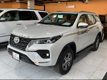 Toyota  Fortuner  2024  Automatic  0 Km  4 Cylinder  Four Wheel Drive (4WD)  SUV  White  With Warranty