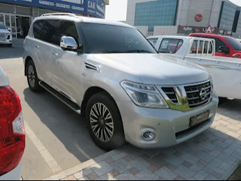  Nissan  Patrol  Platinum  2016  Automatic  233,000 Km  8 Cylinder  Four Wheel Drive (4WD)  SUV  Silver  With Warranty