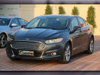 Ford  Fusion  2015  Automatic  300,000 Km  4 Cylinder  Front Wheel Drive (FWD)  Sedan  Gray